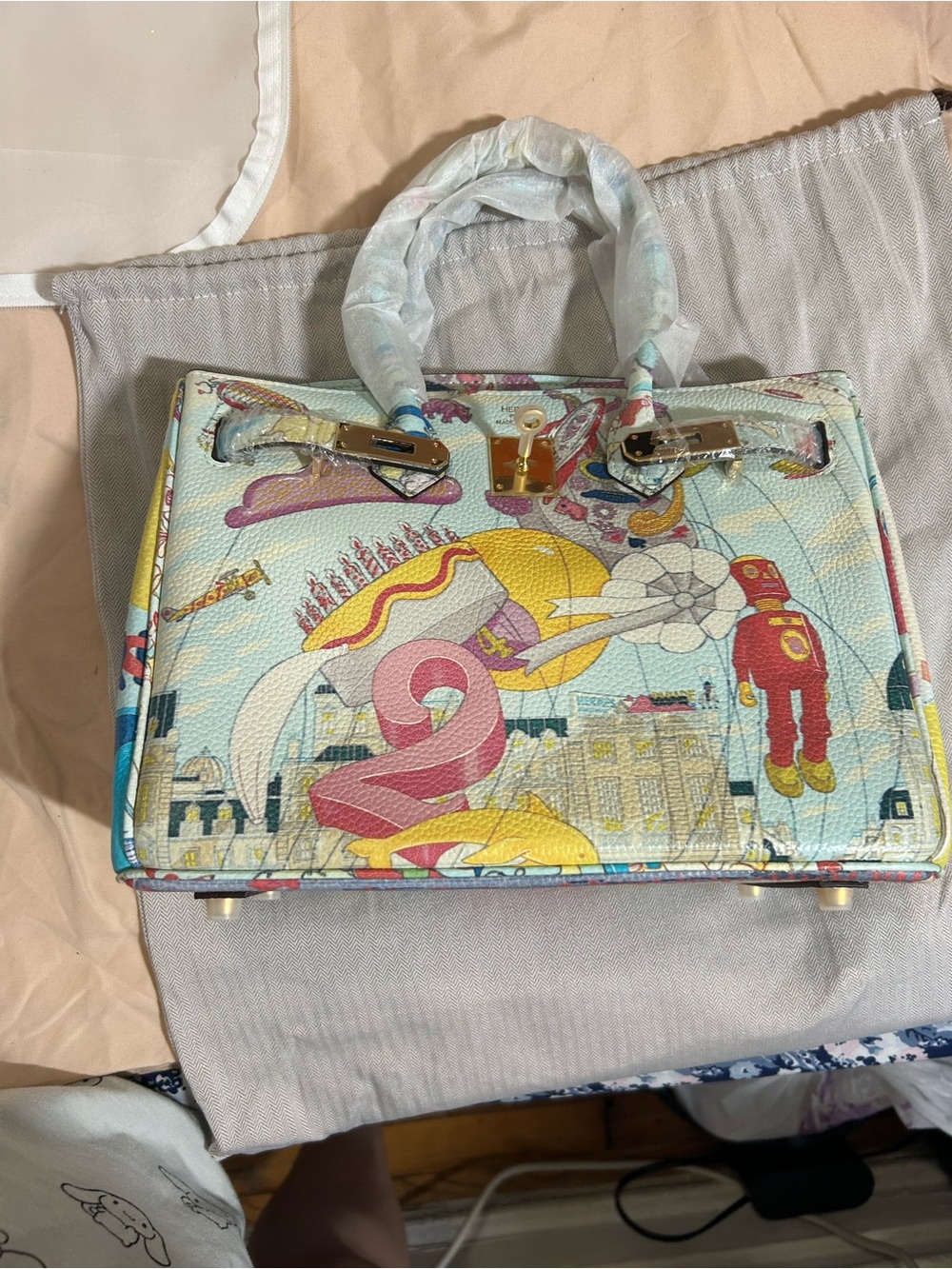 Pastel Illustrated Top-Handle Satchel in Blue, Pink, Yellow - Picture 1 of 9